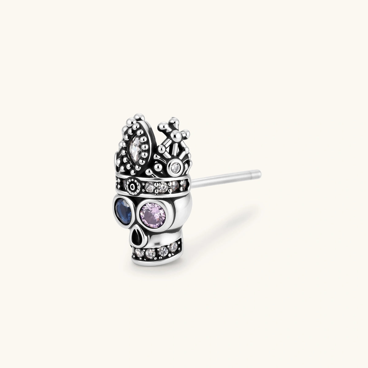 Crowned Skull single stud earring in antique silver plated eco-brass with blue, pink and clear cubic zirconia