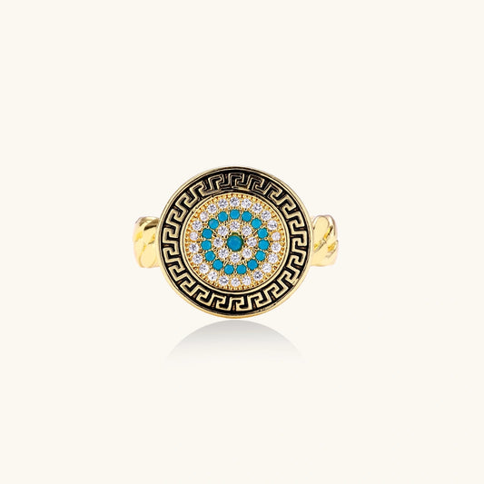 Angled view of Aegean Evil Eye adjustable ring with turquoise and cubic zirconia details