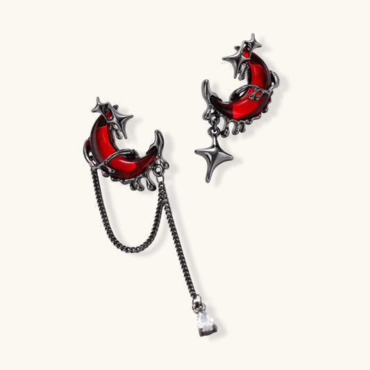 Blood Moon asymmetrical earrings with red crescent moon, chain and star details