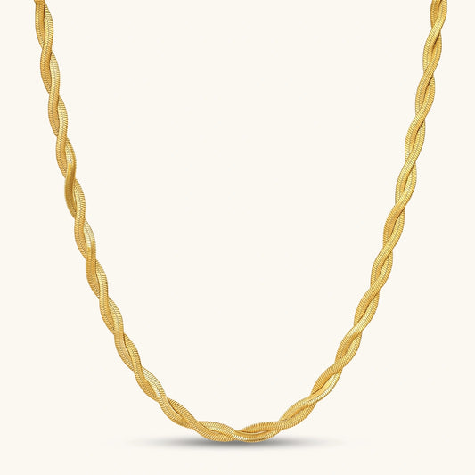 Golden Orbit twisted herringbone chain in 18K gold-plated stainless steel with sculptural braided texture