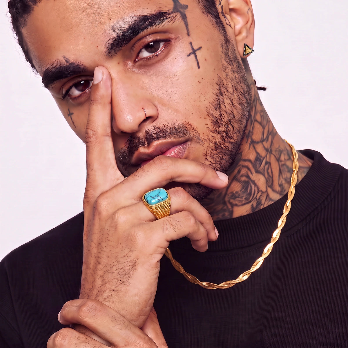 Model wearing the Golden Orbit twisted herringbone chain as a bold gold statement necklace