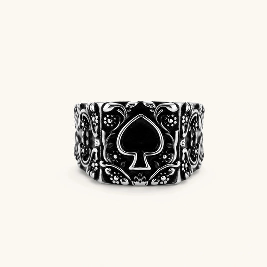 Top view of Midnight Ace of Spades signet ring showing the black enamel spade and ornate relief